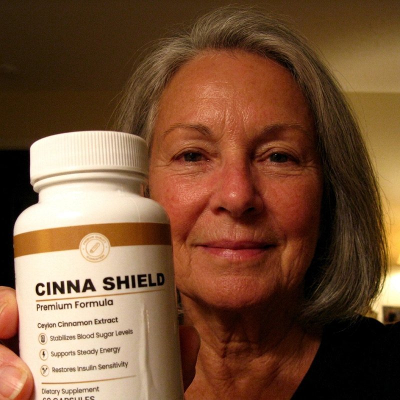 Cinna Shield customer holding their bottle